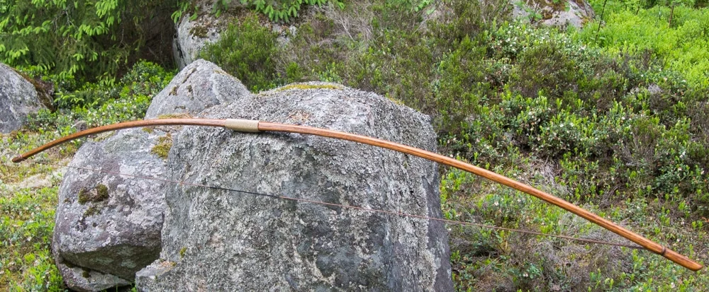 Reconstructed Viking-age yew self-bow in the Hedeby style
