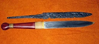 Viking-age single-edged seax with broken-back blade profile