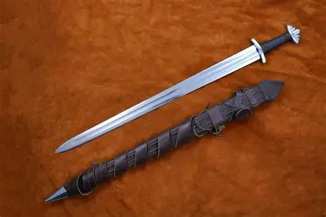 Viking-age double-edged sword with lobed pommel and short crossguard