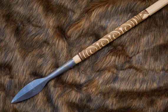 Light Viking-age throwing spear with narrow iron head and shorter haft
